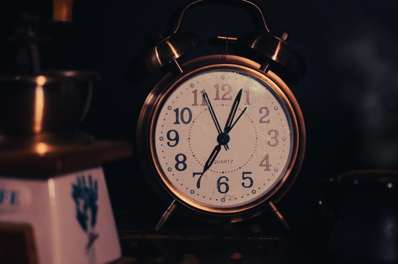 Clock on a wooden surface